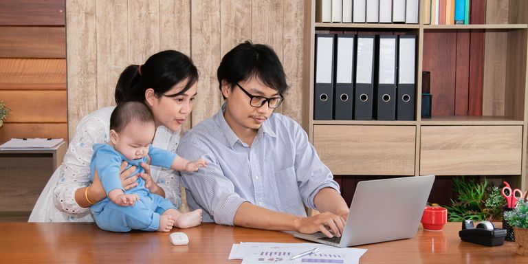 A family sits together planning their future